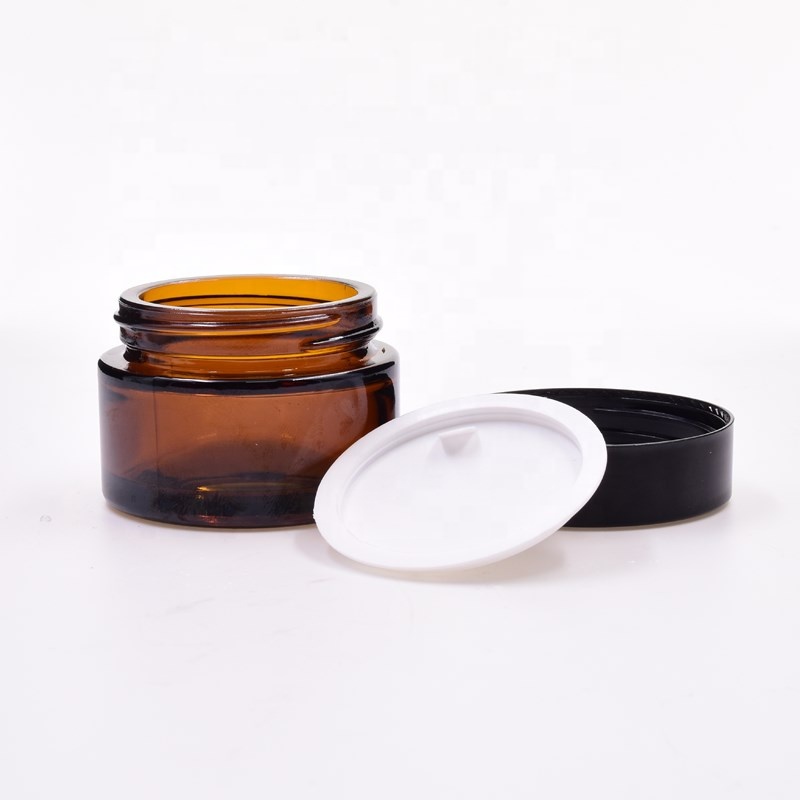 hot selling 1oz 30 ml amber round cosmetic kush packaging custom jar flower packaging child resistant glass jar with plastic lid