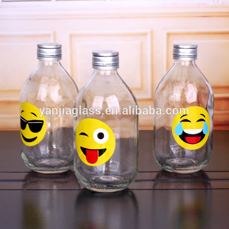 hot selling 330ml clear round glass bottle with screw top lids funny design of juice bottle