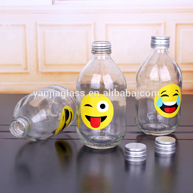 hot selling 330ml clear round glass bottle with screw top lids funny design of juice bottle
