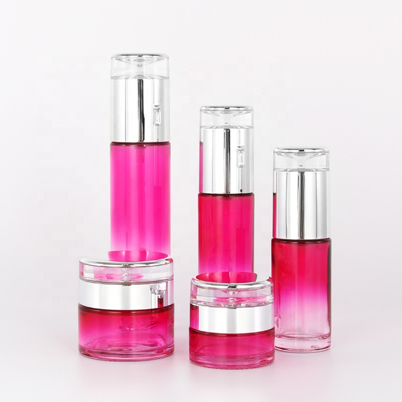 hot selling gradually varied clear pink straight round glass bottle and jar for skincare