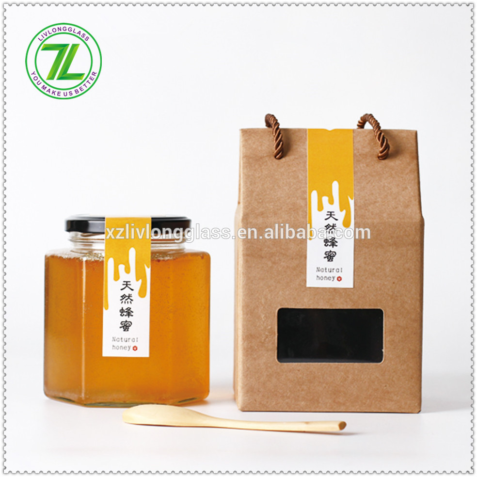 hot selling whole 1000g 730ml 35oz glass bee shaped honey jar glass hexagonal jar for honey package with metal lids