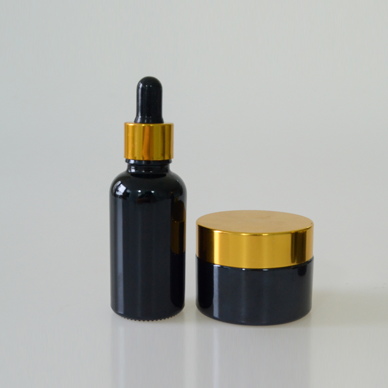 hot selling wholesale 30g 50g black glass cosmetic container jar gold lid
