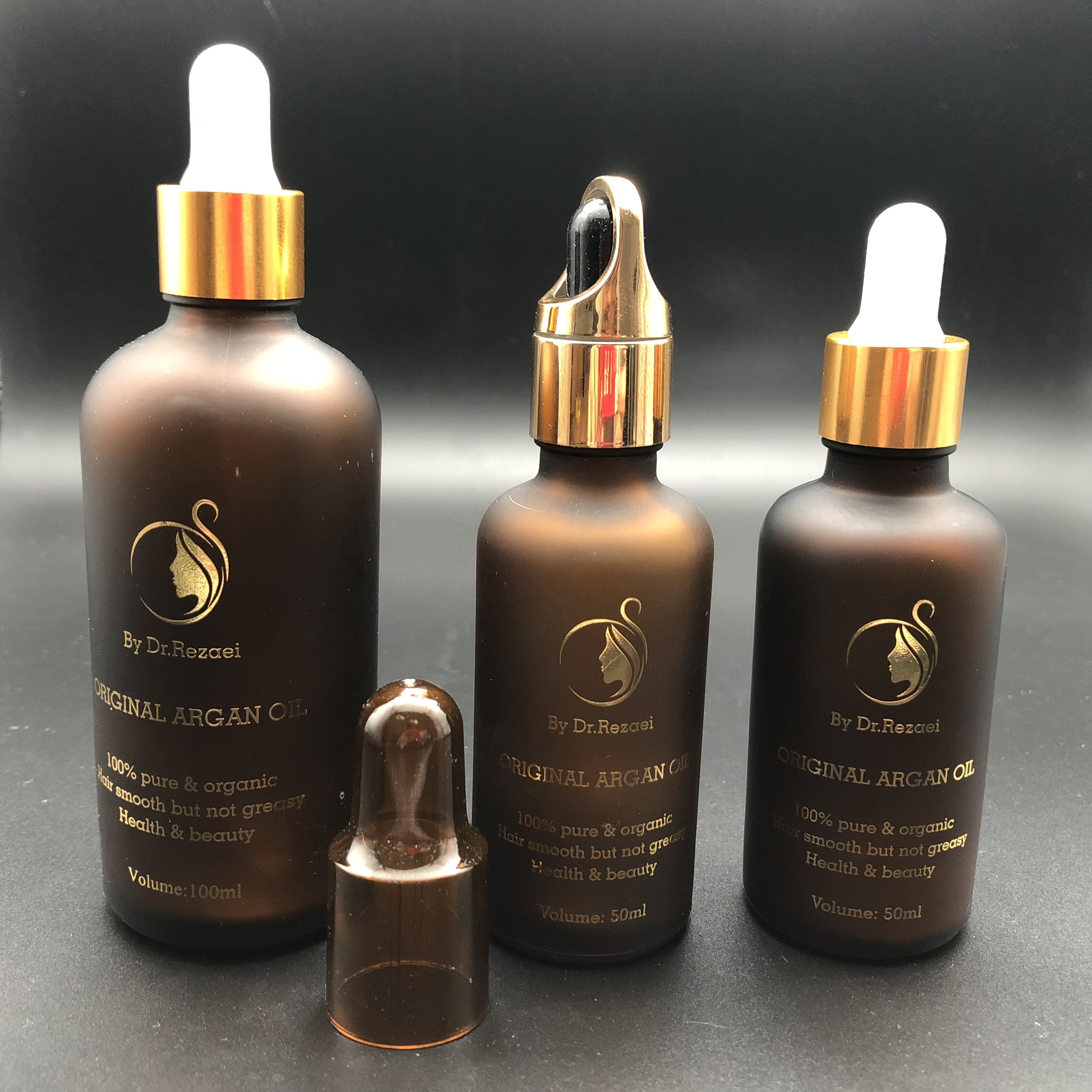 hot stamping 100ml glass pump spray essential oil dropper bottle with golden spray cap