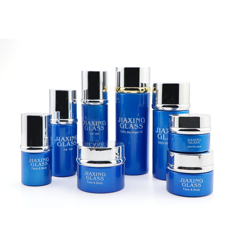 hot stamping red blue glass cosmetic care set packaging bottles and jars