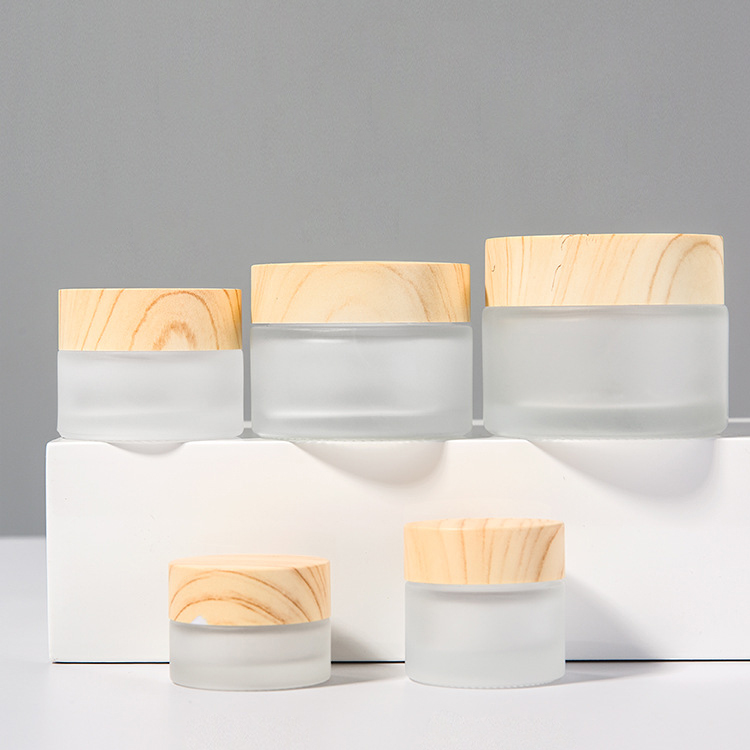 lightweight customized logo easy to use matte thickened Glass Cream Bottle Jar with wood grain cap 50g