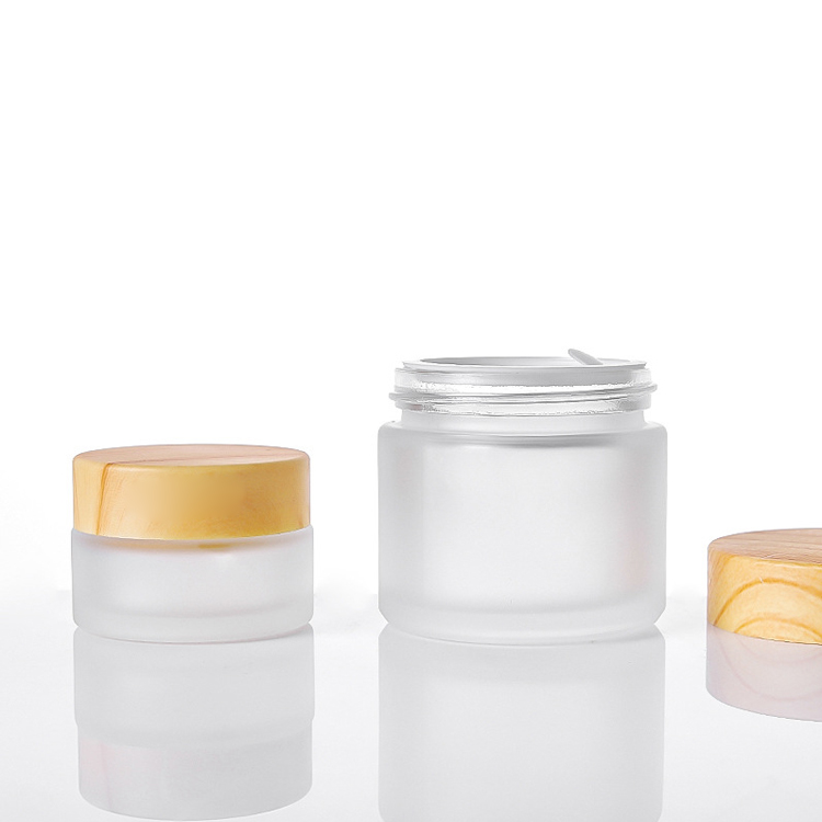 lightweight customized logo easy to use matte thickened Glass Cream Bottle Jar with wood grain cap 50g