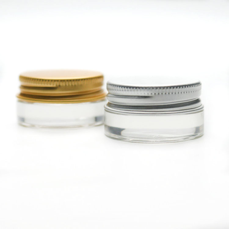 lip balms and lip scrubs glass jar 5g container with gold lid and small plastic spatulas or spoons