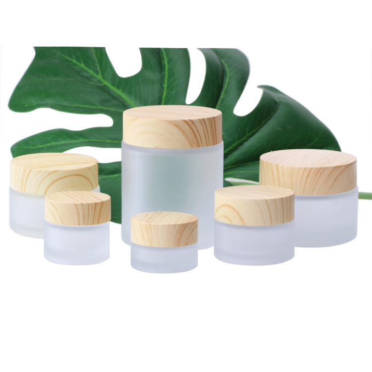 lower price cosmetic containers frosted cream glass jar with bamboo lid bamboo jar with cover