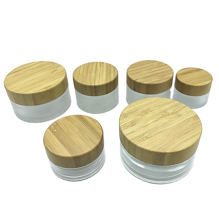 luxury 30g cosmetic frosted glass cream jar with bamboo wood cap