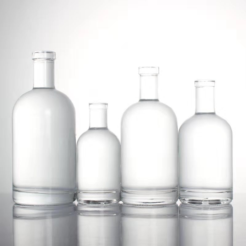 luxury 375 ml 500 ml 750 ml 1000 ml cork top screw GPI top cap round glass bottles for liquor whiskey vodka brandy spirits