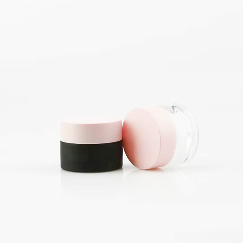luxury Frosted black 1oz 30ml 2oz 60ml round shape luxury Frosted black cream glass jar for body and face with metal pink lid
