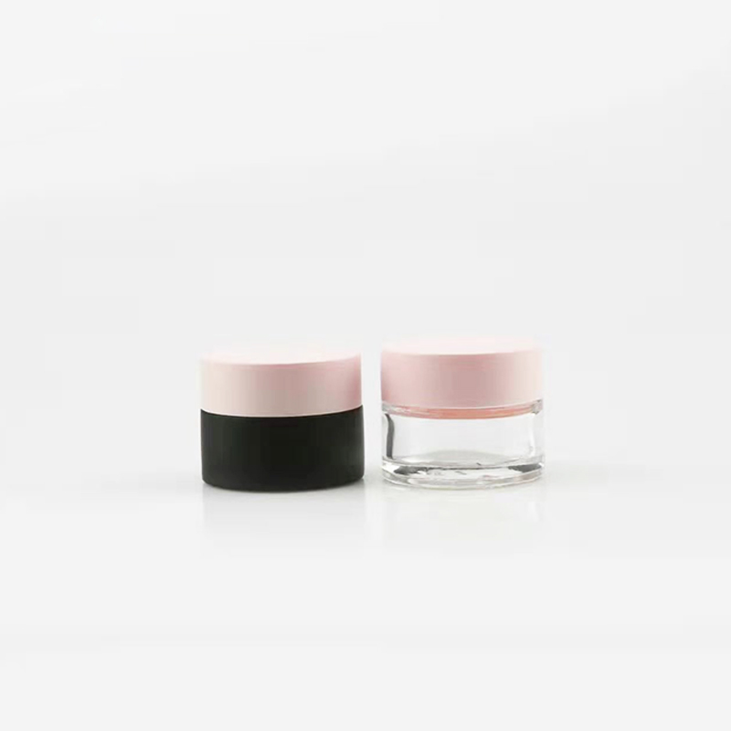 luxury Frosted black 1oz 30ml 2oz 60ml round shape luxury Frosted black cream glass jar for body and face with metal pink lid