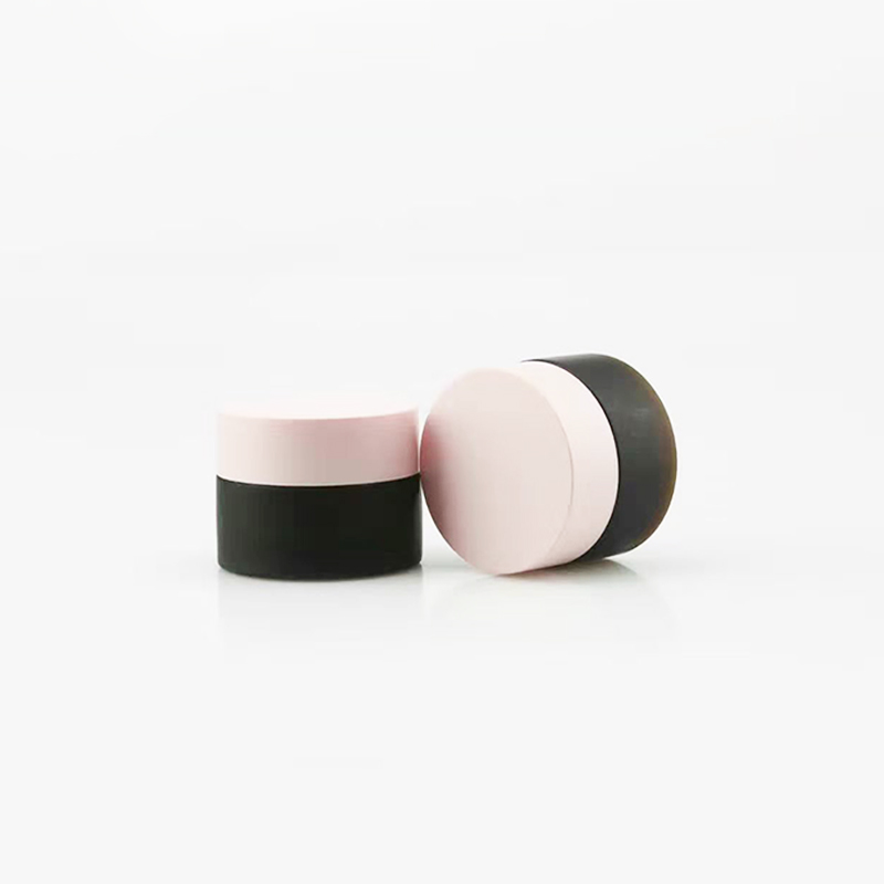 luxury Frosted black 1oz 30ml 2oz 60ml round shape luxury Frosted black cream glass jar for body and face with metal pink lid