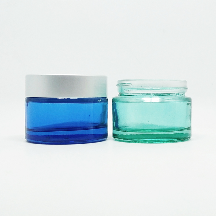 luxury colored glass jar 5ml 10ml 20ml 30ml 50ml 100ml 200ml frosted gradient blue glass cream jar with matte silver lid