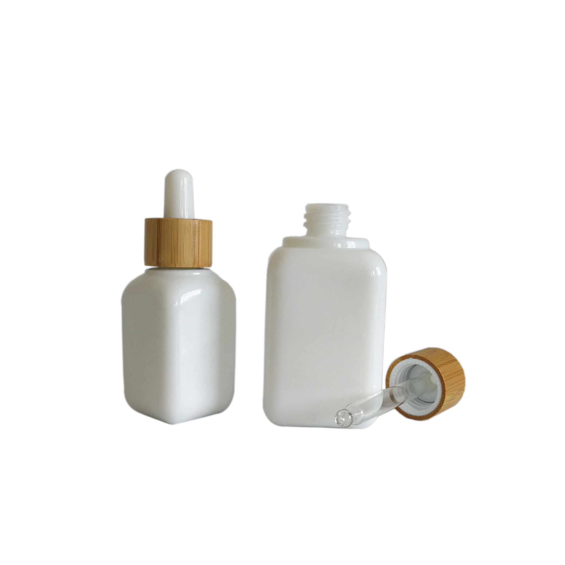 luxury cosmetic packaging 30ml 50ml white glass ceramic squared CBD serums essential oils dropper bottles with bamboo rubber top