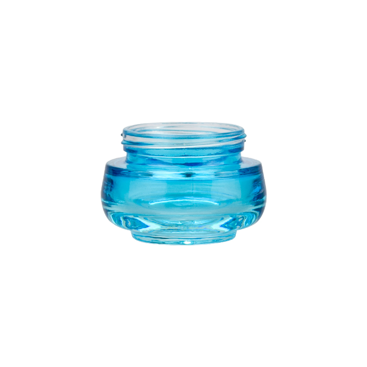 luxury cosmetic packaging 50g oval shape blue glass jar 50ml beauty packaging jars and bottles with shiny silver lid