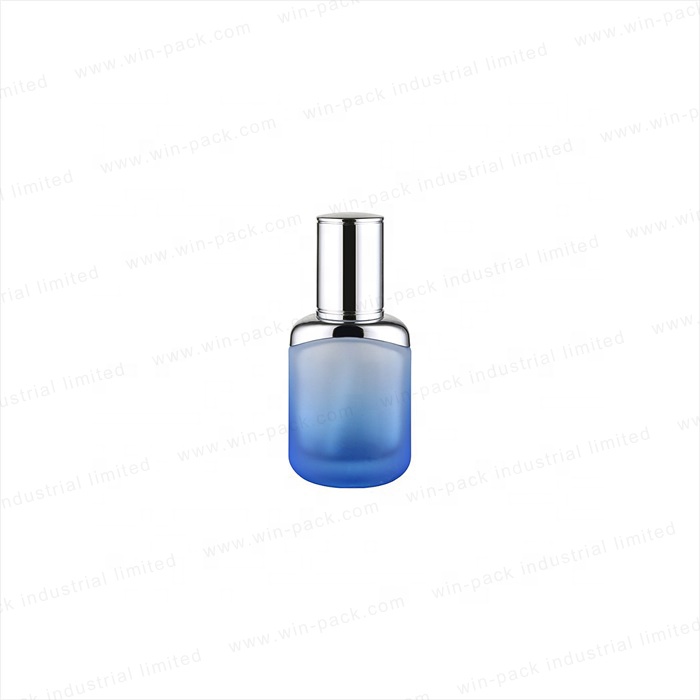 luxury round silver shoulder pretty transparent blue color 35ml 100ml 120ml unique glass lotion pump bottles for cosmetic