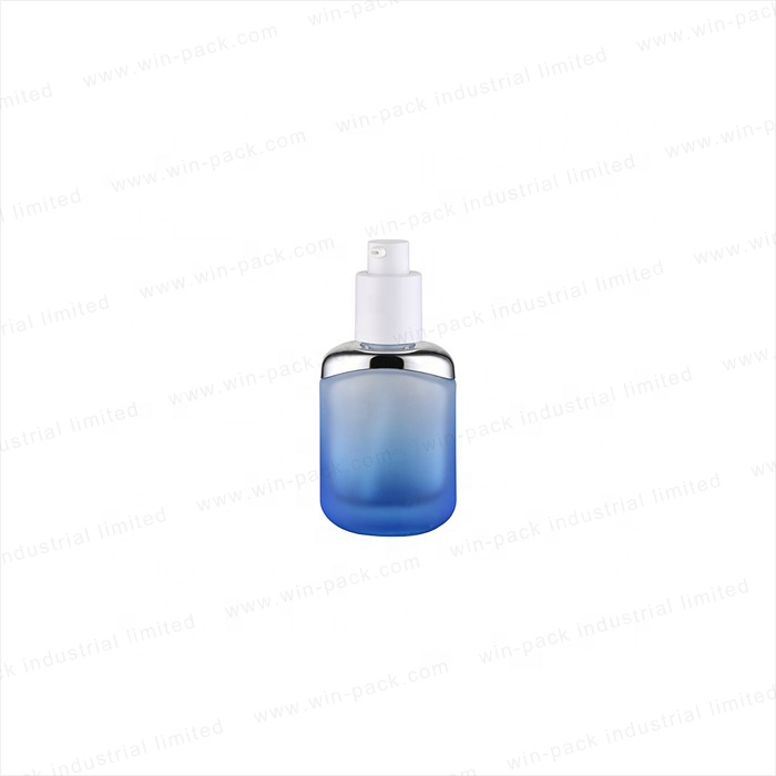 luxury round silver shoulder pretty transparent blue color 35ml 100ml 120ml unique glass lotion pump bottles for cosmetic
