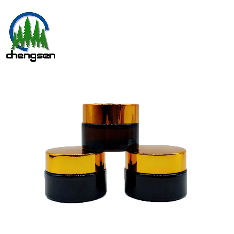 luxury unique 5ml 10ml 20ml 30ml 50ml 100ml Customized Cosmetic Packaging Glass Amber Cream Jar with plastic black aluminum cap
