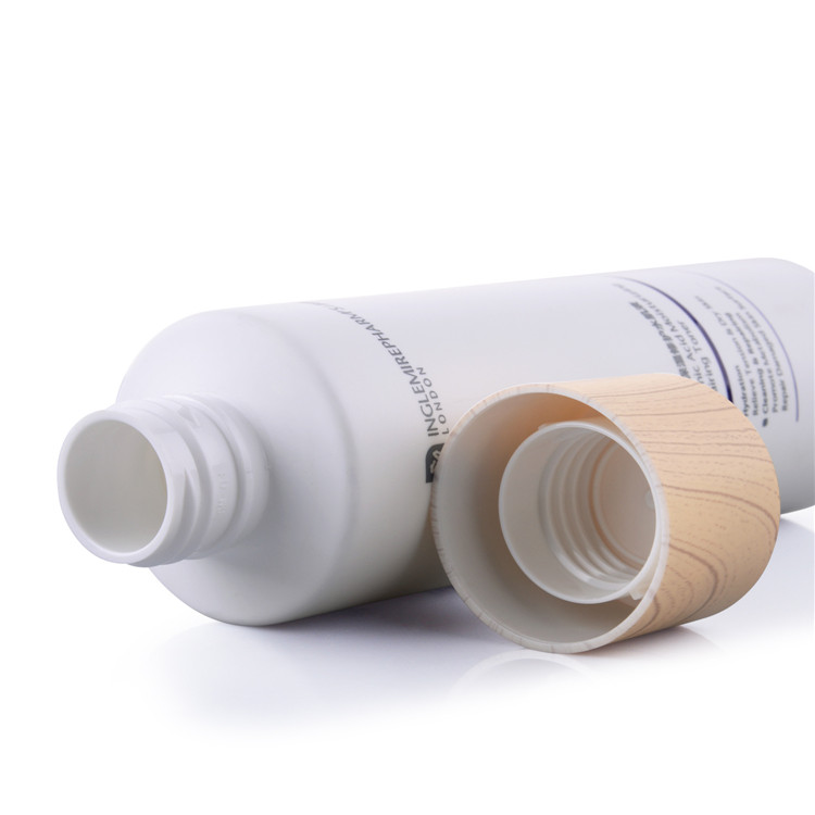 makeup packaging frosted plastic lotion bottle with wood grain cap