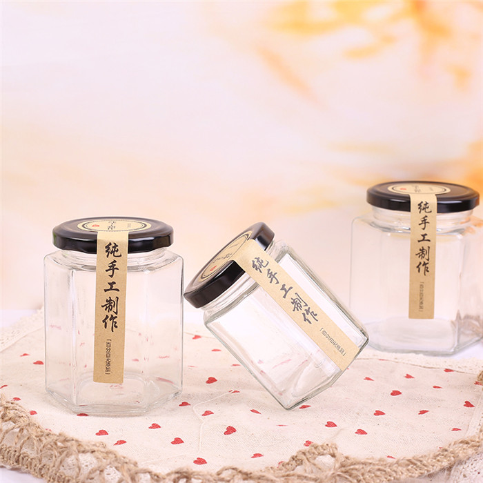 manufacturers different sizes empty hexagon glass jar with screw cap