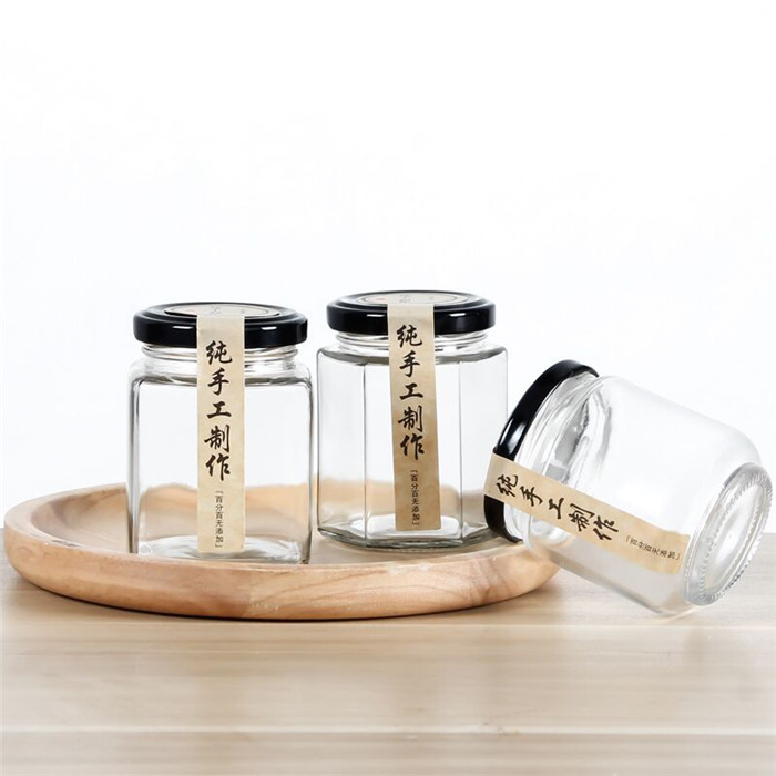 manufacturers different sizes empty hexagon glass jar with screw cap