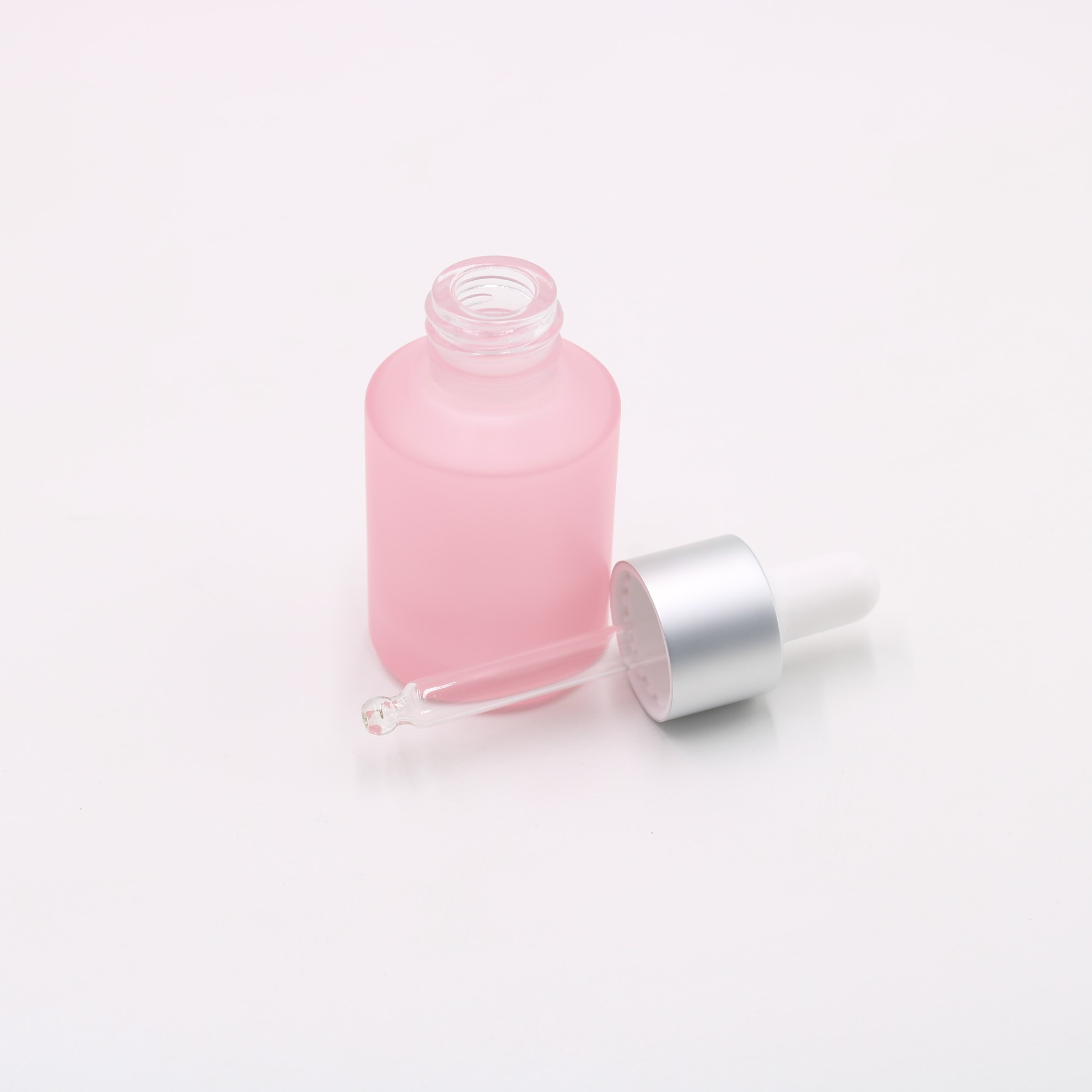 manufacturers wholesale whole set stock luxury cosmetic packaging serum pink glass dropper bottle