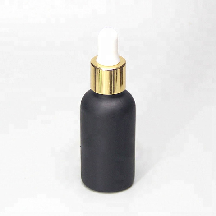 matt black essential cosmetic oil glass bottle 30ml with shiny gold aluminum dropper cap