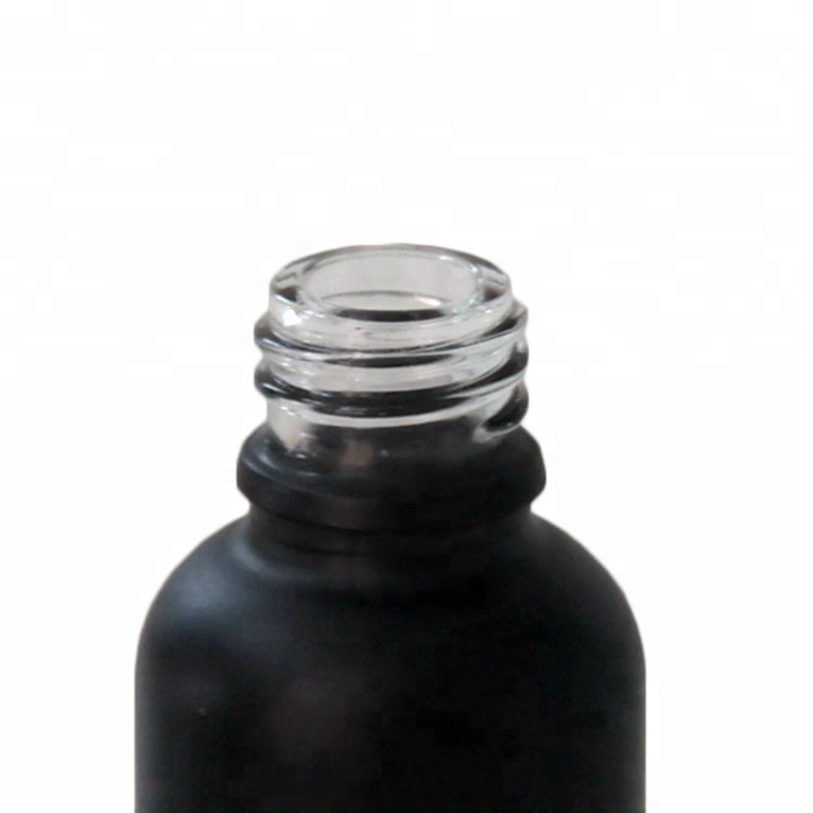 matt black essential cosmetic oil glass bottle 30ml with shiny gold aluminum dropper cap