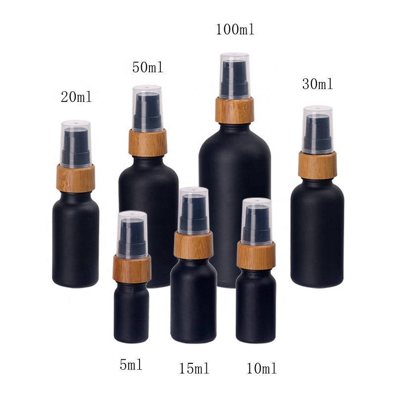 matte black glass bottles 15 ml 30 ml 50 ml 100 ml UV glass essential oil bottles with 18 mm bamboo wooden treatment pump
