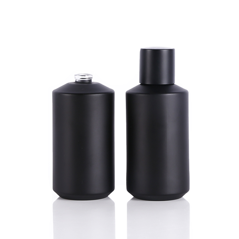 matte black perfume bottle with cap and pump