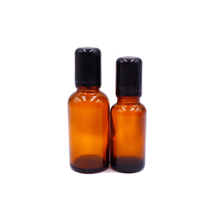 most popular beauty cosmetics empty 1oz amber glass roll on bottle 30ml with stainless steel roller