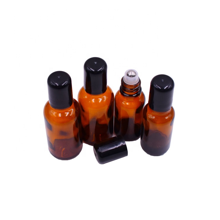 most popular beauty cosmetics empty 1oz amber glass roll on bottle 30ml with stainless steel roller