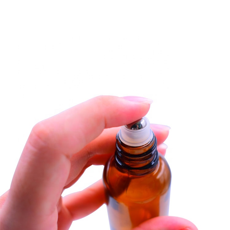 most popular beauty cosmetics empty 1oz amber glass roll on bottle 30ml with stainless steel roller