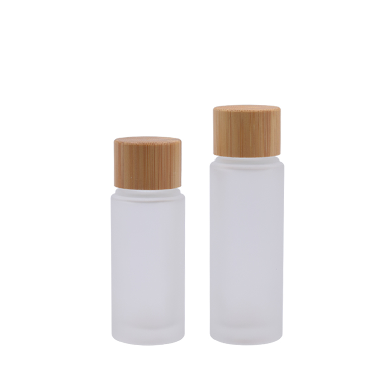 natural bamboo cosmetic packaging frosted glass toner bottles with bamboo cap