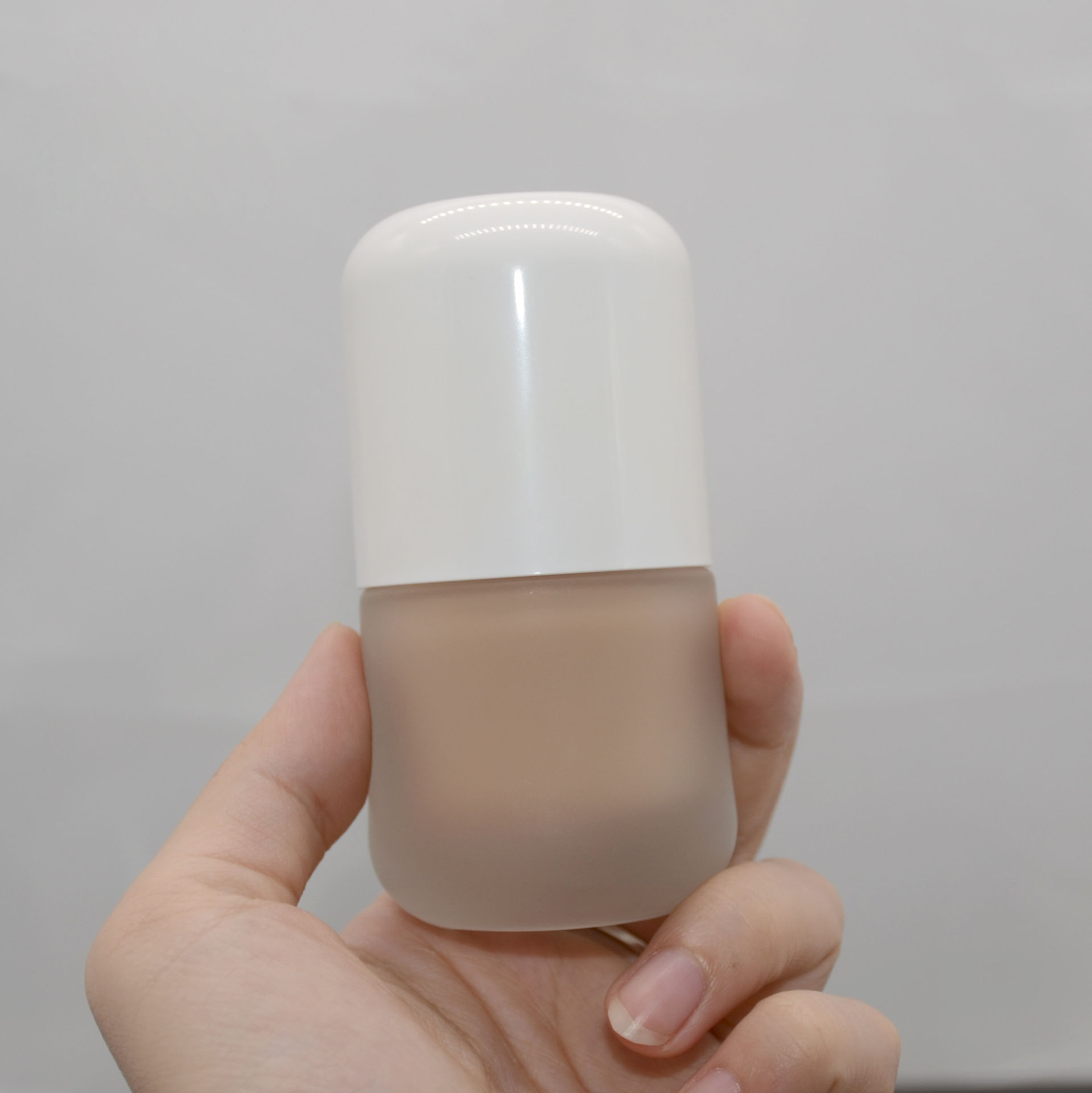 new arrival capsule pill shape skin care lotion liquid foundation sun screen glass bottle for cosmetic packaging