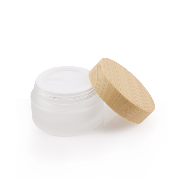 oem wholesale 30 g 50 g 100g 100% nature frosted cosmetic glass jar/wood jar with bamboo lid for skin care cream