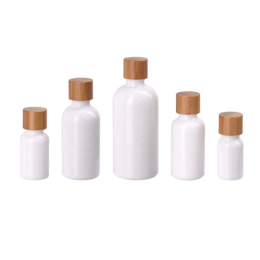 opal glass white color essential oil bottle 10 15 30 ml 50ml 100 ml 200ml white glass essential oil bottle with bamboo screw cap
