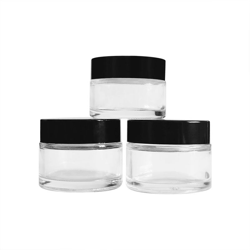 packaging for cosmetics clear glass jar black gold silver white lid cap empty containers for lotions and creams