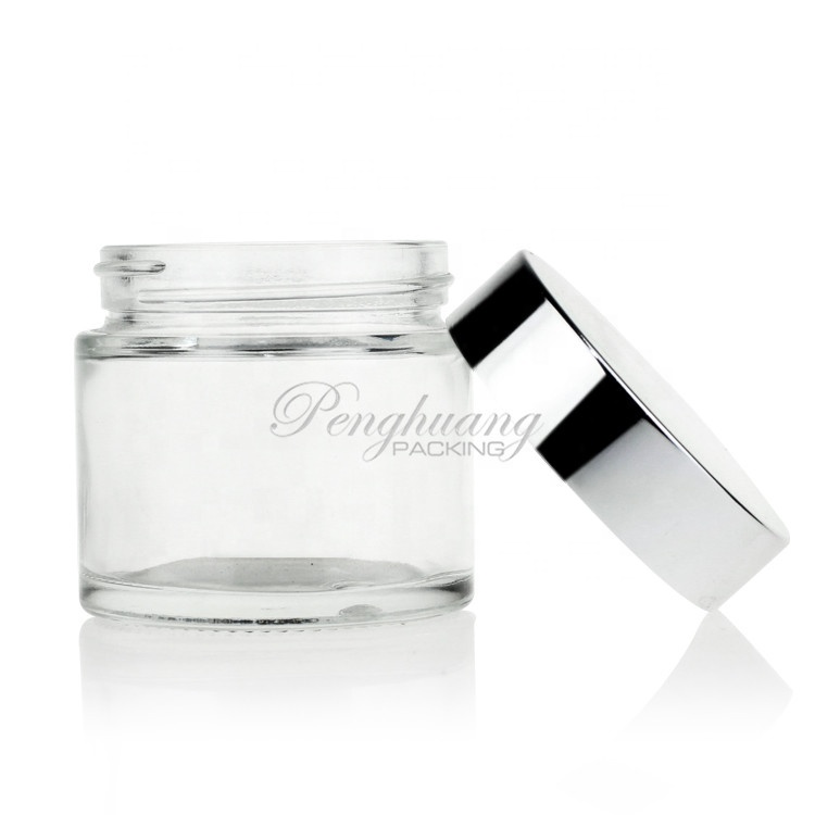 popular clear 2oz 60ml glass cosmetic jar with silver lid for cream guangzhou factory