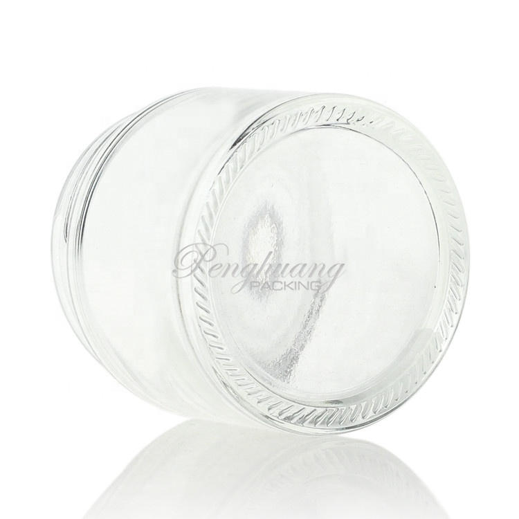 popular clear 2oz 60ml glass cosmetic jar with silver lid for cream guangzhou factory