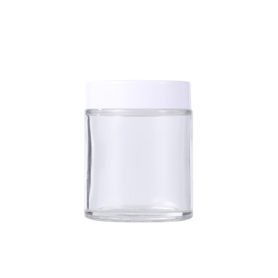 popular shaped moisturiser round glass jar with white screw top lid