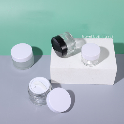 popular shaped moisturiser round glass jar with white screw top lid