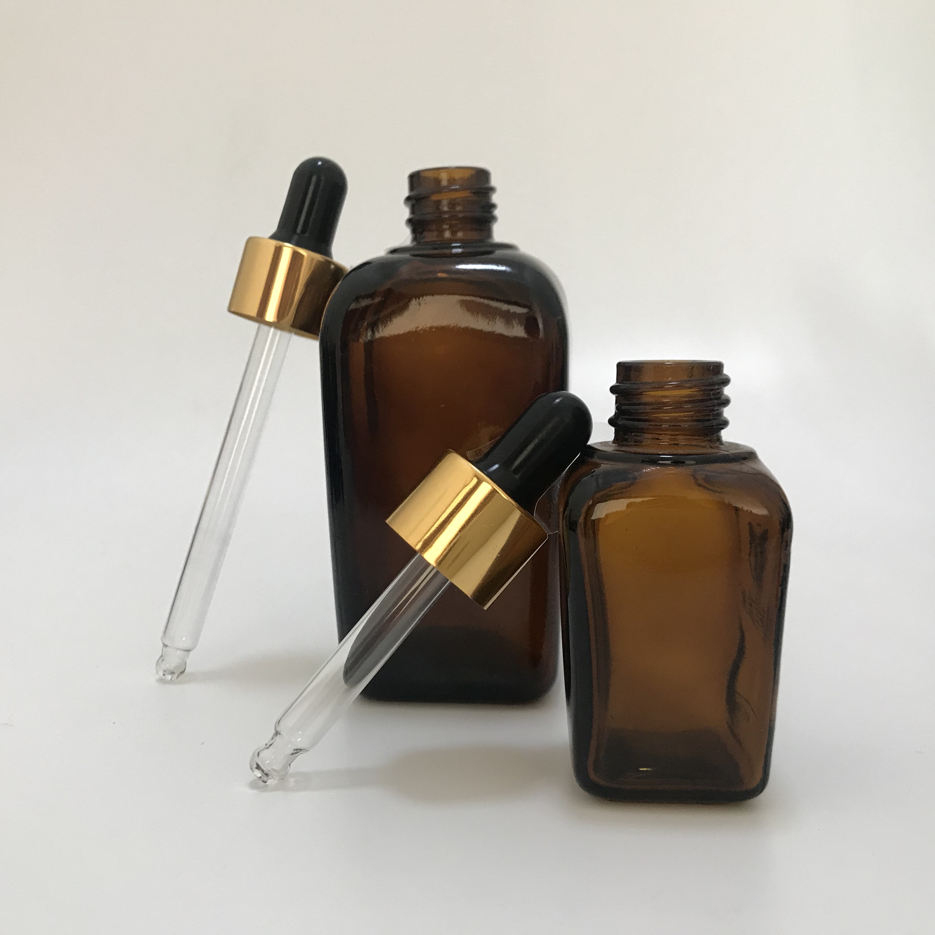 rectangular 30 ml glass essential oil bottle dropper 30ml glass square amber bottle for sale