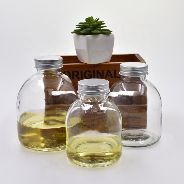 recycled 250ml clear round milk tea glass beverage bottle cold pressed juice drinking wine bottles packing with metal screw lid