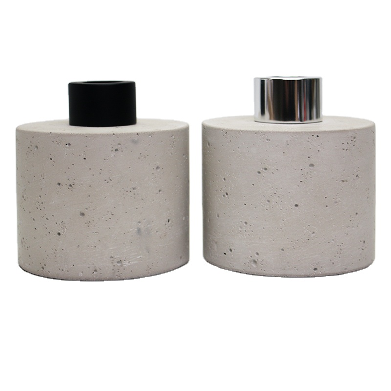 reed diffuser bottle with concrete effect the glass bottle is wrapped with concrete outside bottle and cap