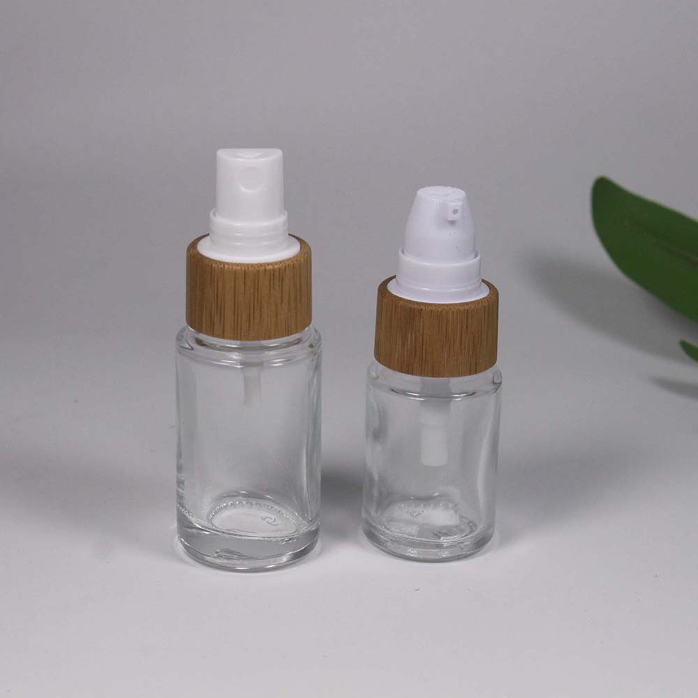 retail and Wholesale 15/20/25/30/50/ML transparency glass lotion/spray pump bottle with bamboo cap skin care container