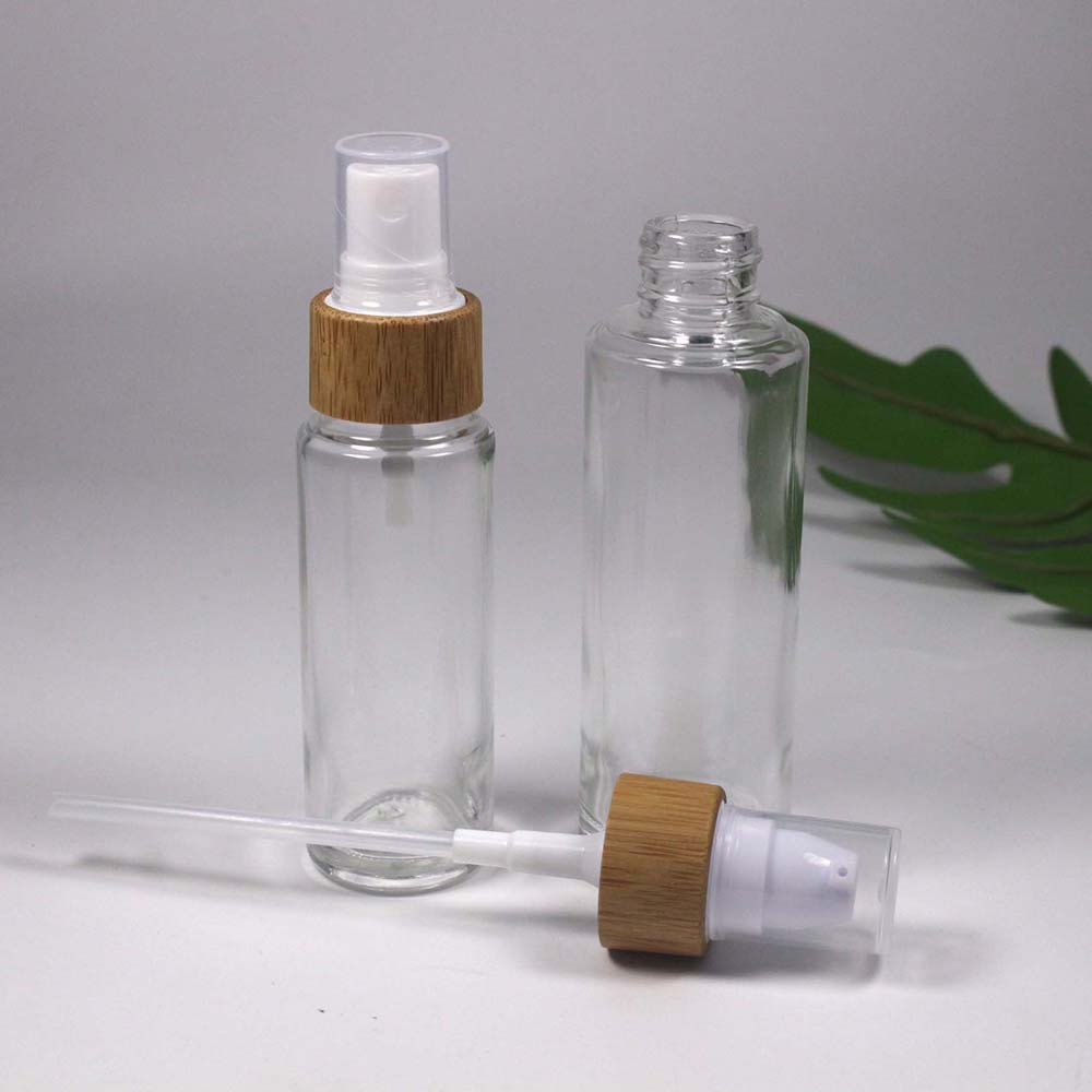 retail and Wholesale 15/20/25/30/50/ML transparency glass lotion/spray pump bottle with bamboo cap skin care container
