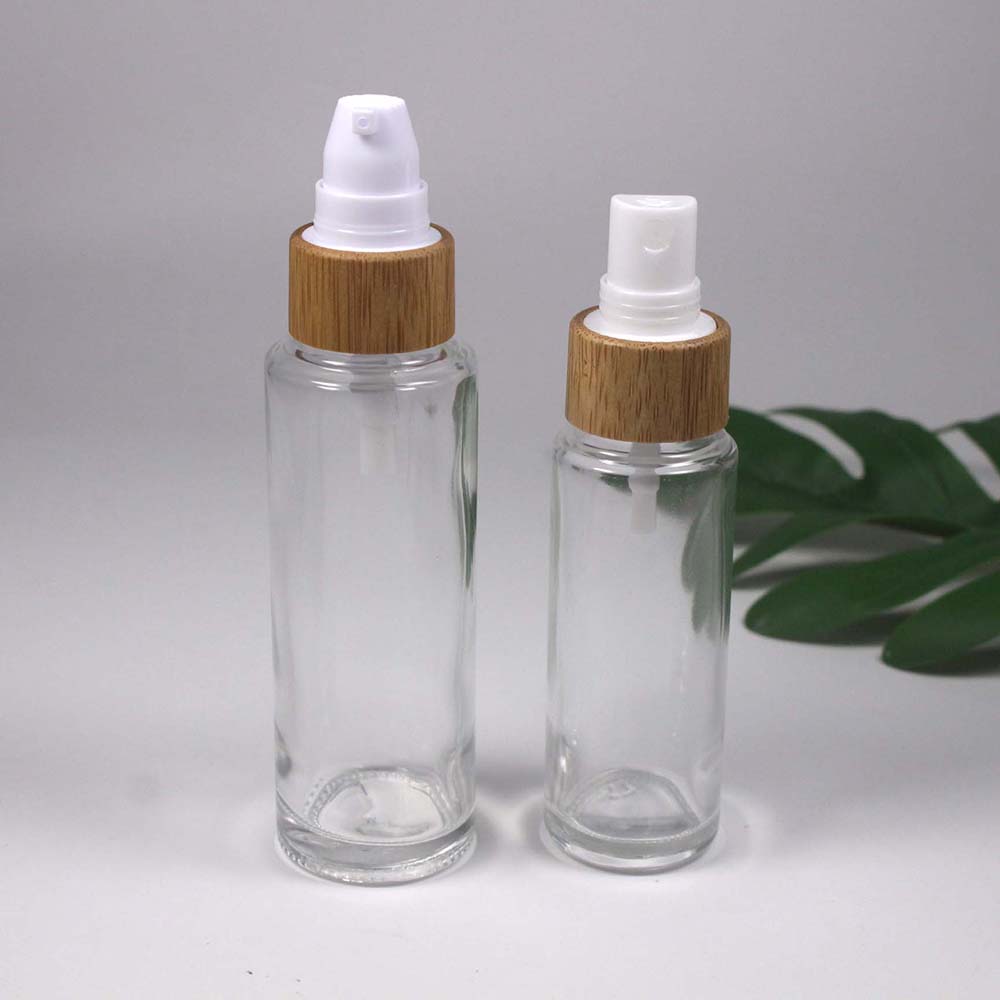 retail and Wholesale 15/20/25/30/50/ML transparency glass lotion/spray pump bottle with bamboo cap skin care container