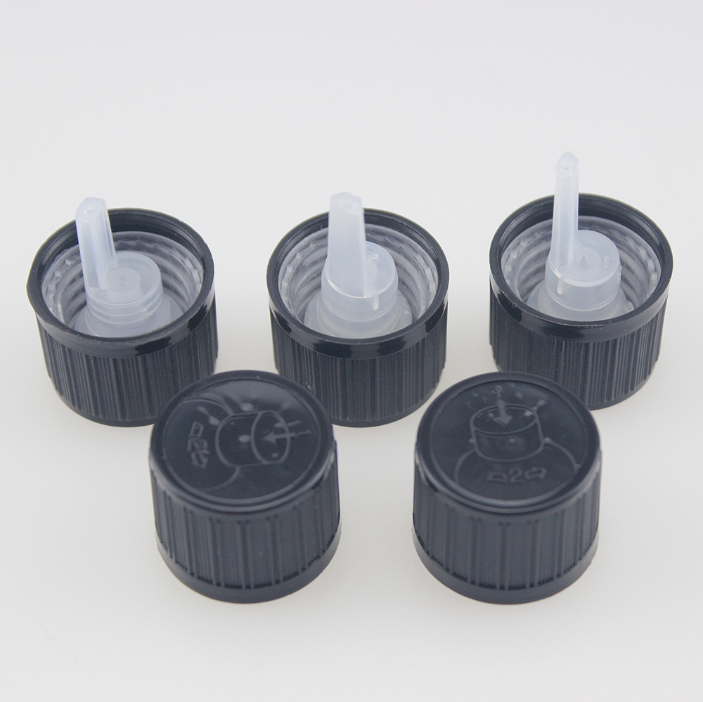 ribbed black CRC child proof cap oil euro dripper green glass round bottle